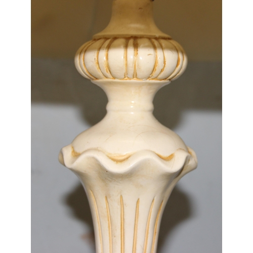 252 - Pottery lamp & shade of classical form & a pair of large metal candlesticks with brushed finish