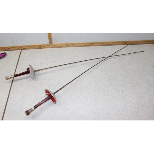 710 - 2 Leon Paul fencing swords in case