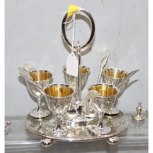 1041 - Qty of assorted interesting antique and later silver plated items to inc an egg cruet, an unusual mo... 