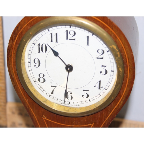 1317 - Swiss movement Edwardian mahogany inlaid cased balloon clock on brass bun feet.