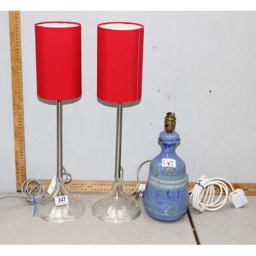 247 - Pair of designer glass flared based table lamps with brushed steel columns and red shades and a blue... 