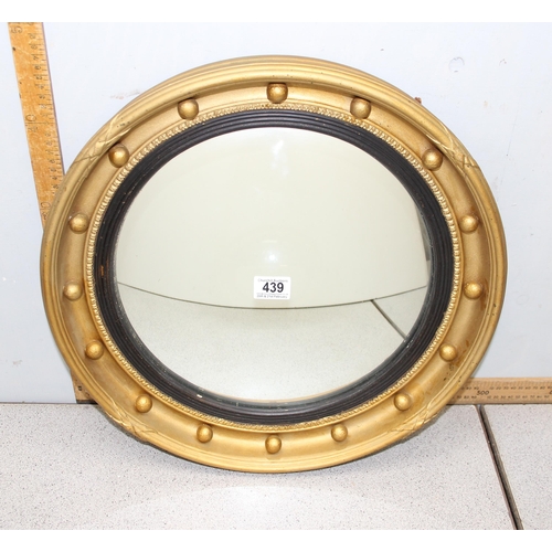 439 - A Georgian style gilt framed convex mirror, approx 48cm in diameter