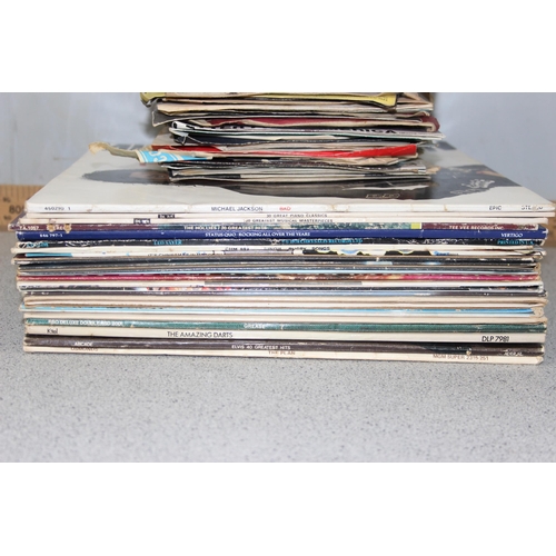 604 - Qty of vintage LP's & 7 inch singles to include Michael Jackson & Status Quo