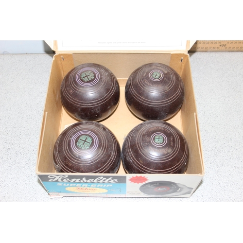 705 - A boxed set of 4 lawn bowls