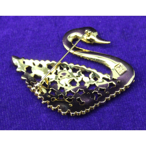 1181 - Swarovski yellow metal jewelled swan brooch & a Swarovski tie pin