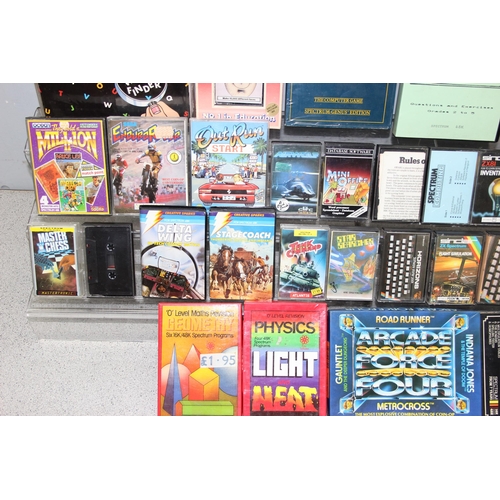 1540 - 40 boxed / cased Sinclair ZX Spectrum computer games to include airwolf & out run.