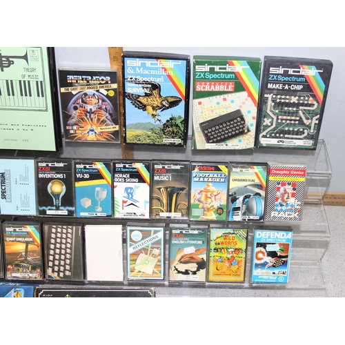 1540 - 40 boxed / cased Sinclair ZX Spectrum computer games to include airwolf & out run.