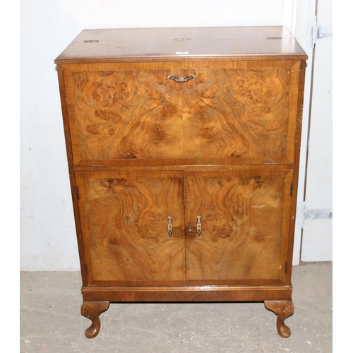 166 - An early 20th century walnut effect drinks or cocktail cabinet made by Herkel Furniture, approx 80cm... 