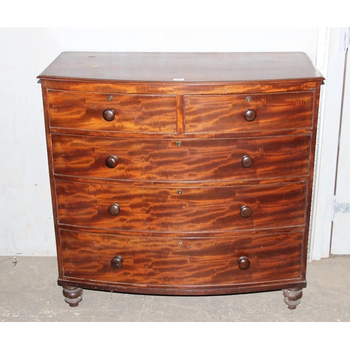 167 - A Victorian mahogany bow fronted 2 over 3 chest of drawers with bun handles, approx 107cm wide