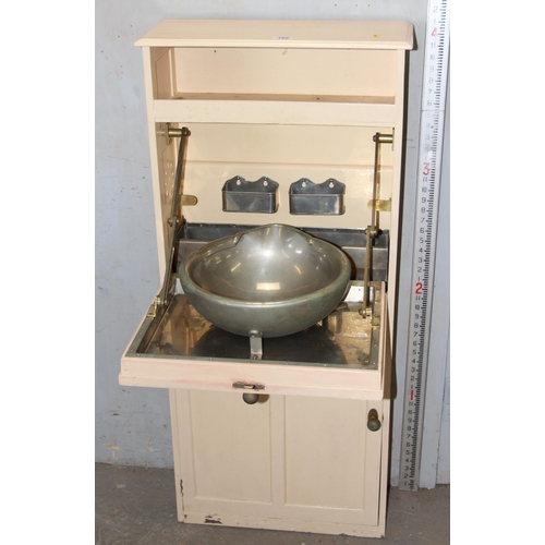 169 - An unusual early 20th century wash cabinet with metal fittings, likely off a ship or a military camp... 