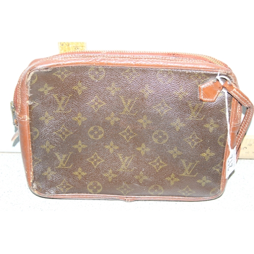 212 - A genuine vintage Louis Vuitton hand bag, approx 26cm wide