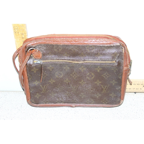 212 - A genuine vintage Louis Vuitton hand bag, approx 26cm wide