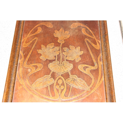 299 - An early 20th century Art Nouveau wooden serving tray with brass handles, approx 58cm wide