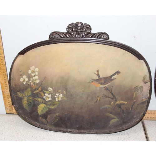 480 - 2 antique oval oil on canvas paintings of birds amongst foliage, in decorative wooden frames with so... 