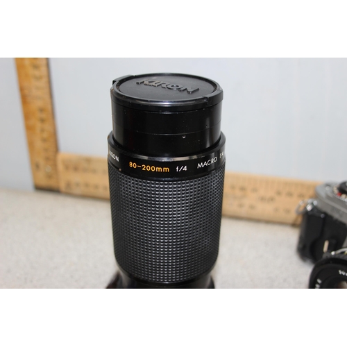 665 - Nikon FG 35mm film camera with Series E 50mm 1:1.8 lens, Kiron 80-200mm lens and other accessories i... 