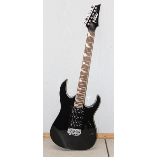 614 - Ibanez GRG170DX electric guitar with black body, in associated soft shell case