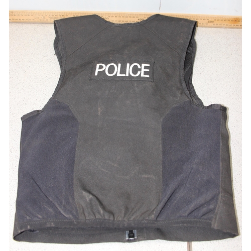 1443 - A police gillet jacket and a military assault vest