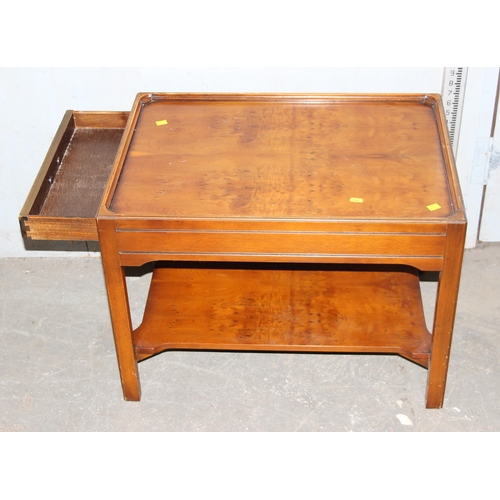 171 - A yew wood hall unit with slide and a similar coffee or side table