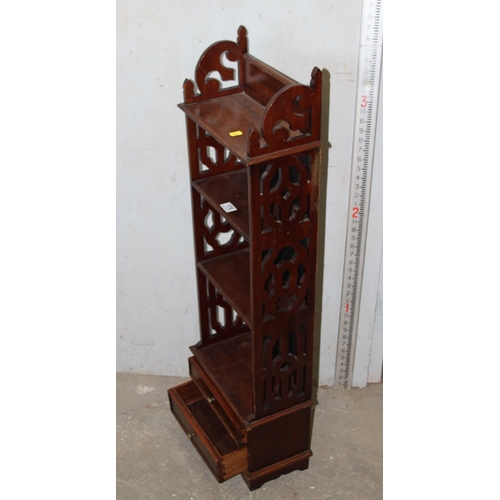 176 - A set of small wooden bookshelves with fretwork ends and 2 small drawers, approx 110cm tall x 35cm w... 