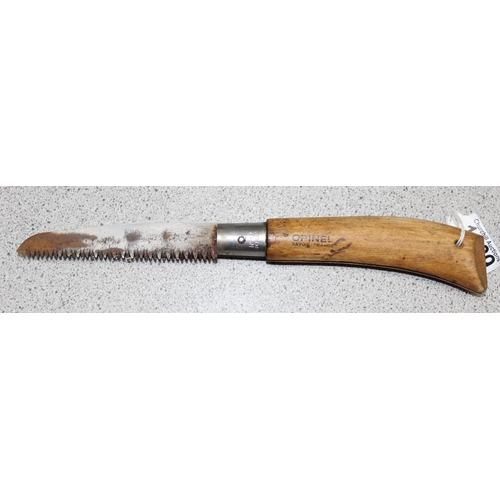 1439 - Large Opinel folding saw & a German Riesling advertising bottle opener