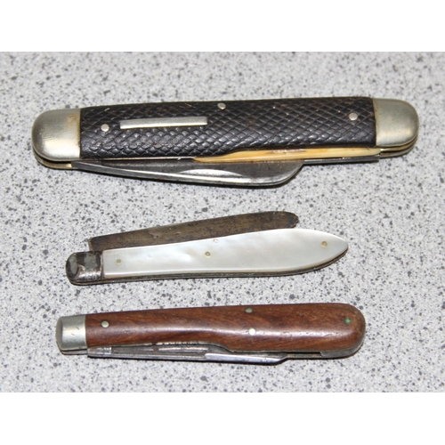 1440 - 3 interesting folding knives to include a silver bladed fruit knife, a corn knife by Wheatley brothe... 