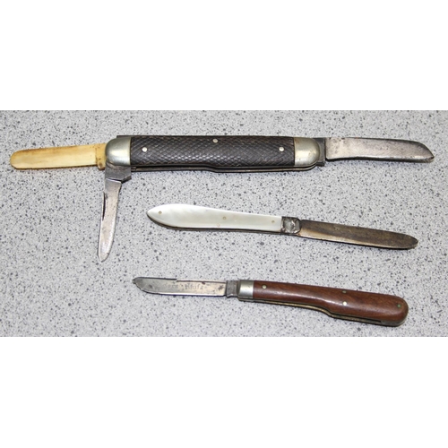 1440 - 3 interesting folding knives to include a silver bladed fruit knife, a corn knife by Wheatley brothe... 