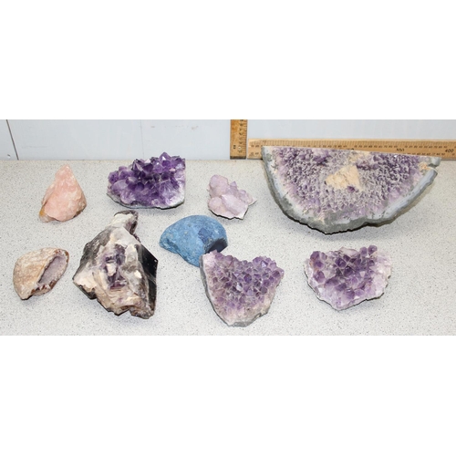 1811 - 9 assorted purple rock crystal geodes, various sizes