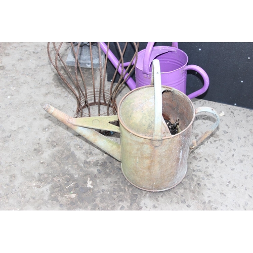 329 - Qty of garden odds to include galvanised watering can & framed garden wall mirrors