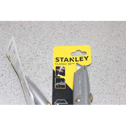 875 - 10 assorted new Stanley knives with packaging