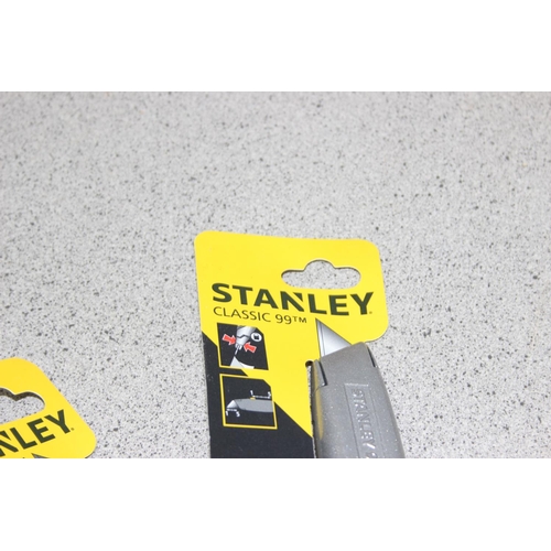 877 - 10 assorted new Stanley knives with packaging