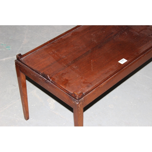 117 - An early 20th century mahogany low table