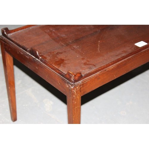 117 - An early 20th century mahogany low table