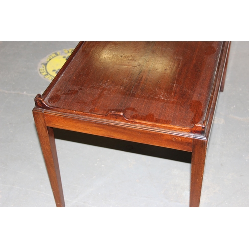 117 - An early 20th century mahogany low table