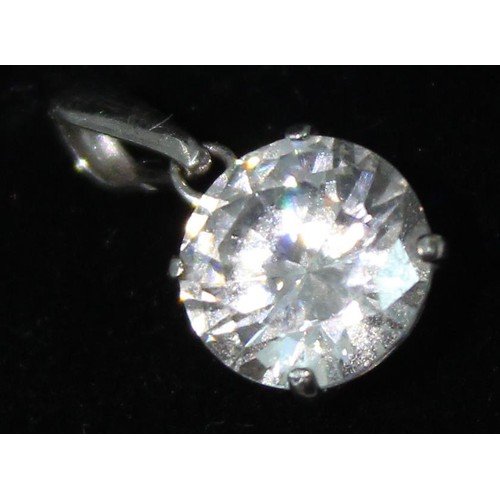 1141 - Jewellery (2) - a 9ct white gold mounted solitaire white stone pendant, approx 0.71g gross and a mod... 