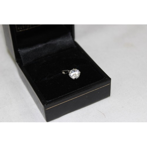 1141 - Jewellery (2) - a 9ct white gold mounted solitaire white stone pendant, approx 0.71g gross and a mod... 