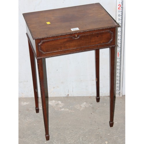 98A - A late Victorian or Edwardian mahogany sewing table with velvet lined interior standing on spade leg... 