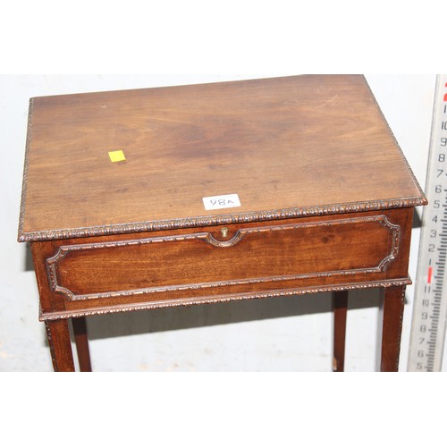 98A - A late Victorian or Edwardian mahogany sewing table with velvet lined interior standing on spade leg... 