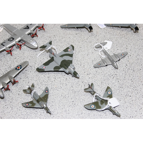 1547 - A glazed table top display case containing 8 Dinky diecast aeroplanes