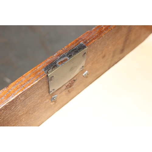 10 - An antique oak 2 over 2 chest of drawers with brass handles and bracket feet, approx 110cm wide