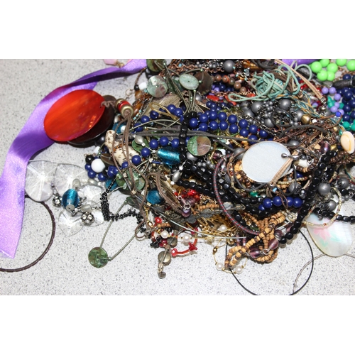 1106 - Approx 2.3kg of mixed costume jewellery