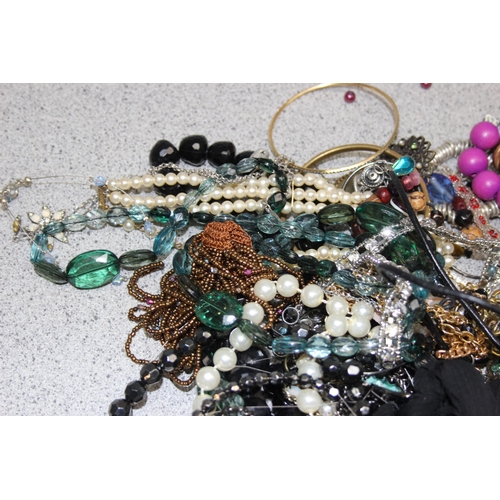 1108 - Approx. 2.4kg of mixed costume jewellery