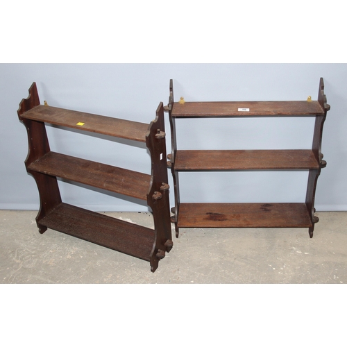 15 - A pair of antique mahogany fretwork wall shelves, each approx 55cm wide