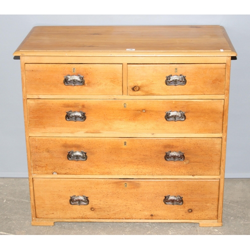 16 - An antique pine 2 over 3 chest of drawers with impressive Art Nouveau handles, approx 100cm wide