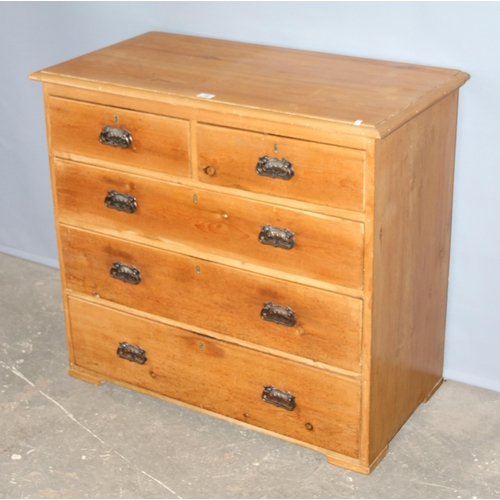 16 - An antique pine 2 over 3 chest of drawers with impressive Art Nouveau handles, approx 100cm wide