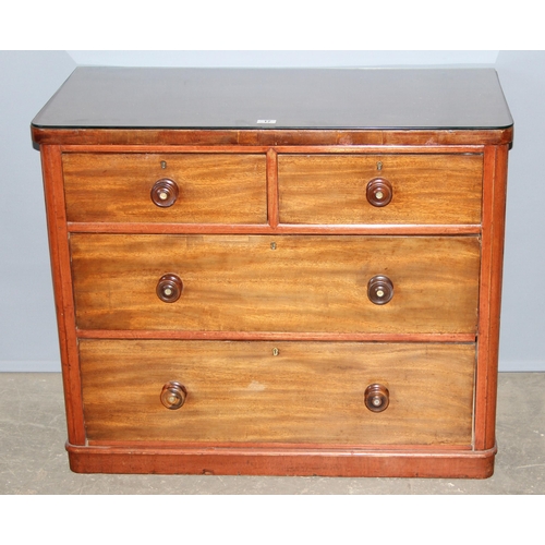 17 - A Victorian mahogany 2 over 2 chest of drawers with mother of pearl inlaid bun handles, approx 100cm... 