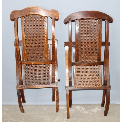 4 - A matched near pair of late 19th or early 20th century folding campaign chairs with Bergere seats an... 