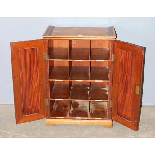 8 - An early 20th century mahogany pigeon hole alphabetical filing cabinet with inlaid doors, approx 67c... 