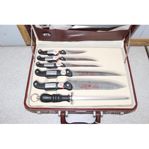 800 - A cased 8 piece knife set by Berman & Benz of Solingen