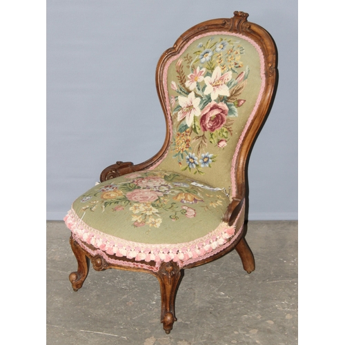 9 - An antique bedroom or nursing chair with carved wooden frame and tapestry seat and back, late 19th c... 