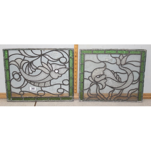 363 - 2 early 20th century leaded stained glass windows depicting mythical sea beasts, each approx 44cm x ... 